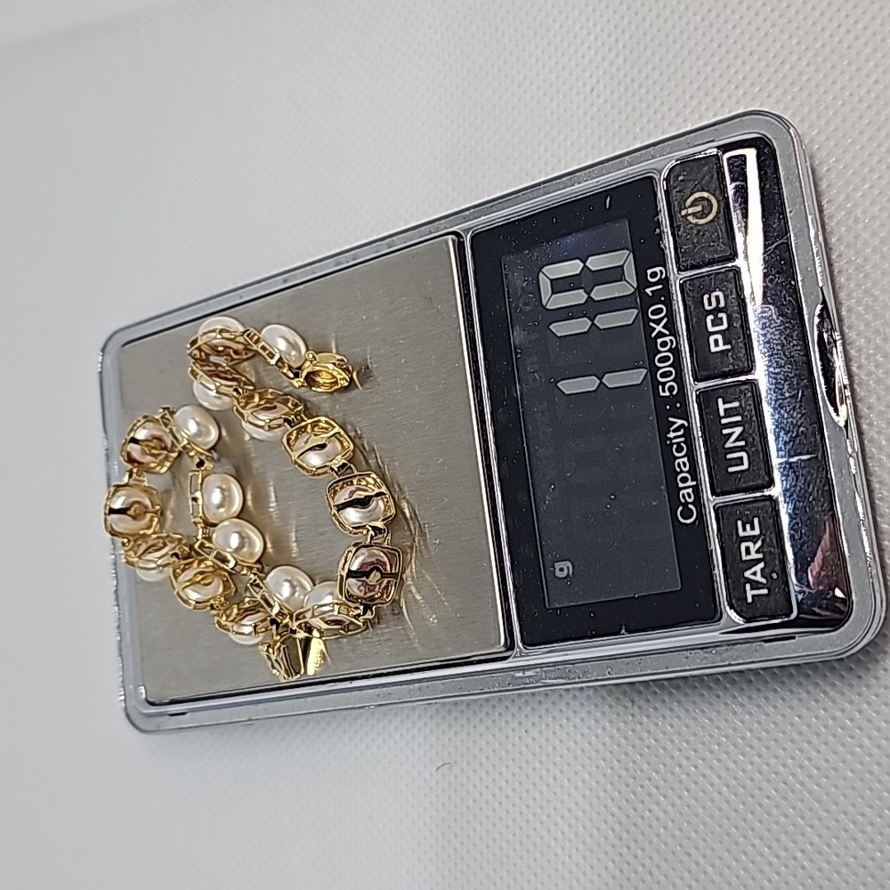 14k mabe bracelet, 7.75" long, 11 grams